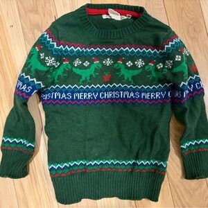 Festive Green Kids Sweater with Dinosaur Pattern